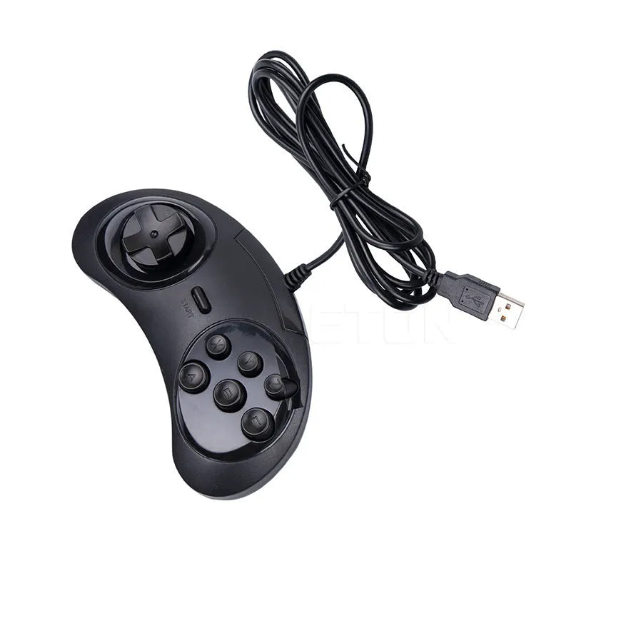 Black Sega USB PC game controller with 1.8 metre cable on a desk