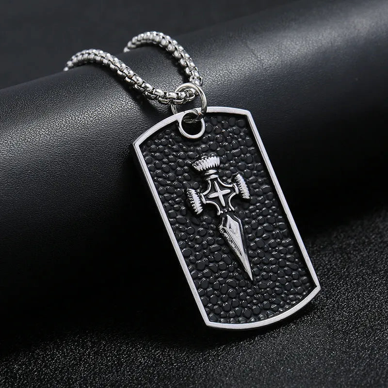 Men's Korean style necklace with alloy pendant and stainless steel chain on a flat surface