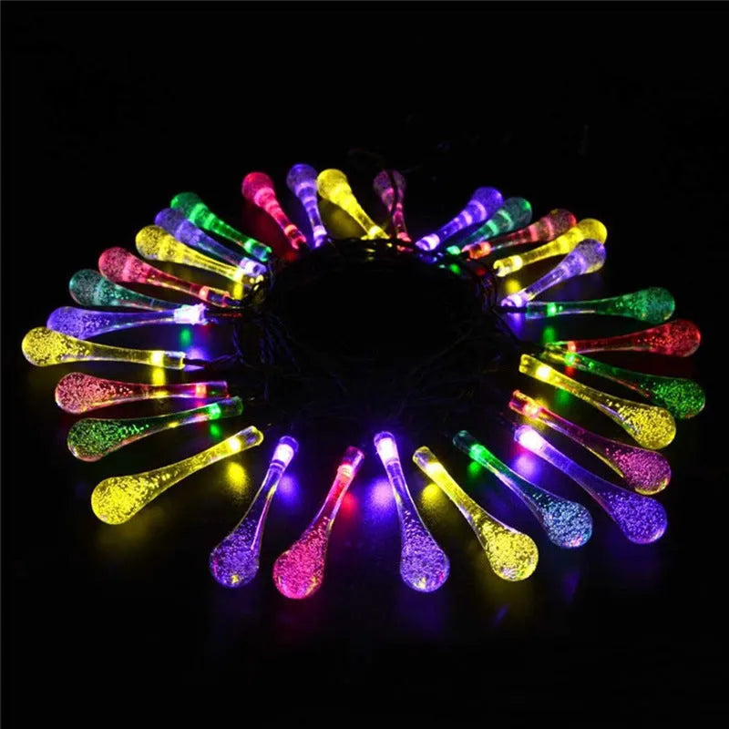 Solar-powered LED water drops string lights with 30 bulbs on 6.5 metre waterproof cable for outdoor garden use