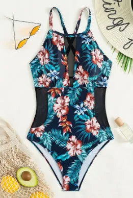 Women's deep V-neck one-piece swimsuit in a printed design, available in sizes S to XL.