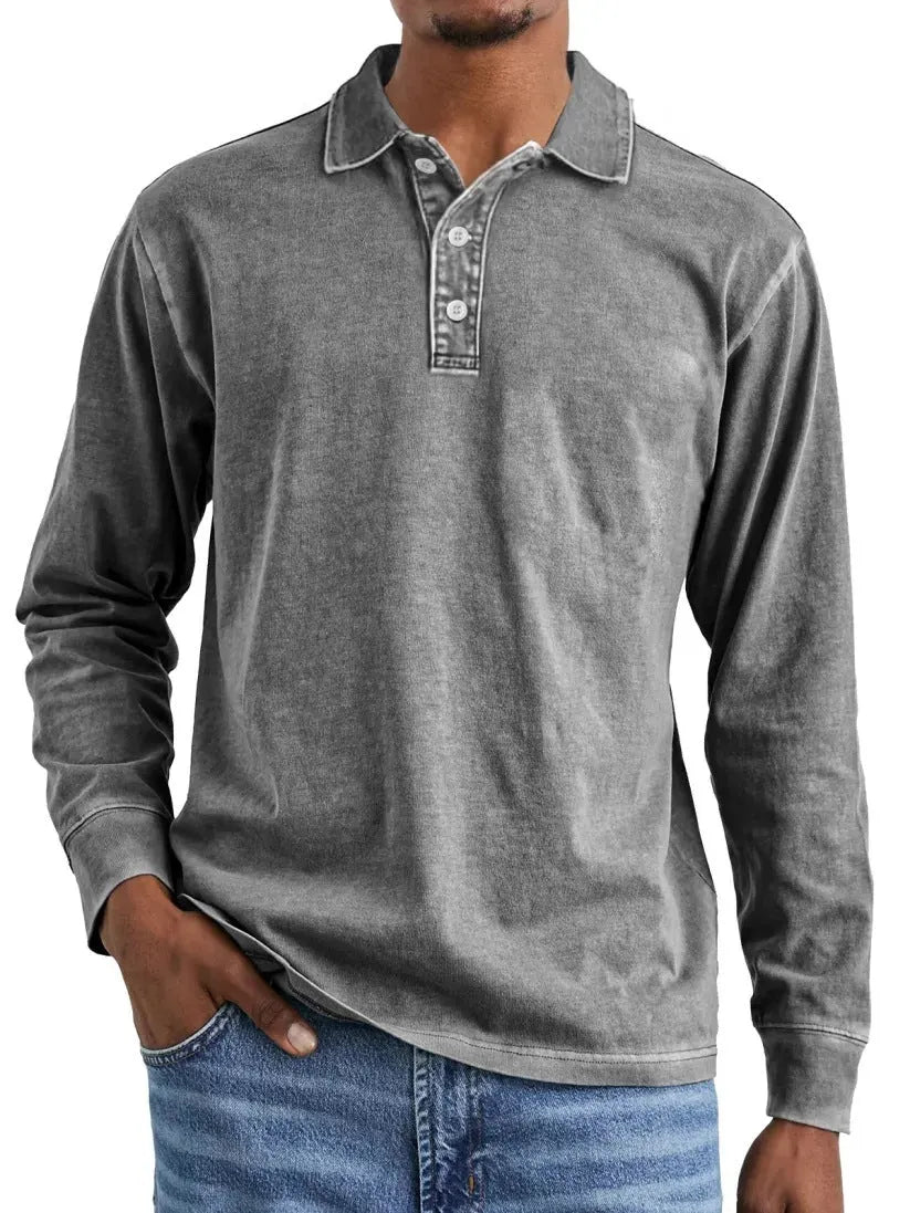 Retro washed pure cotton polo shirt with a distressed lapel and long sleeves on a hanger.