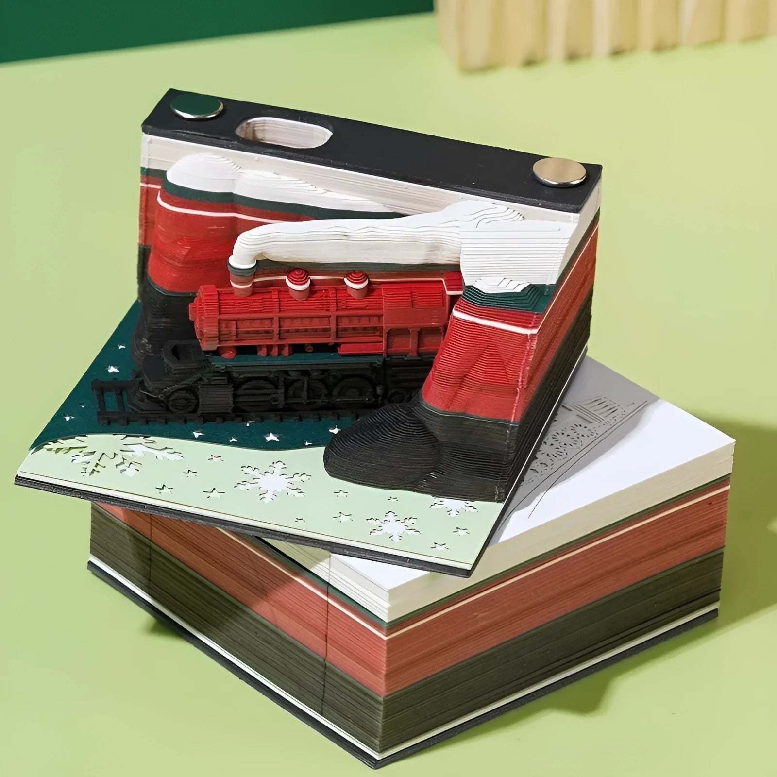 3D paper carving sticky notes depicting Qingshui Temple with a Christmas train design on the cover.