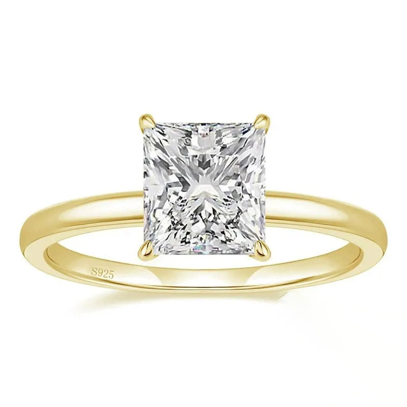 A geometric 925 silver ring with a round zirconium detail, shown in silver, gold, and rose gold finishes.