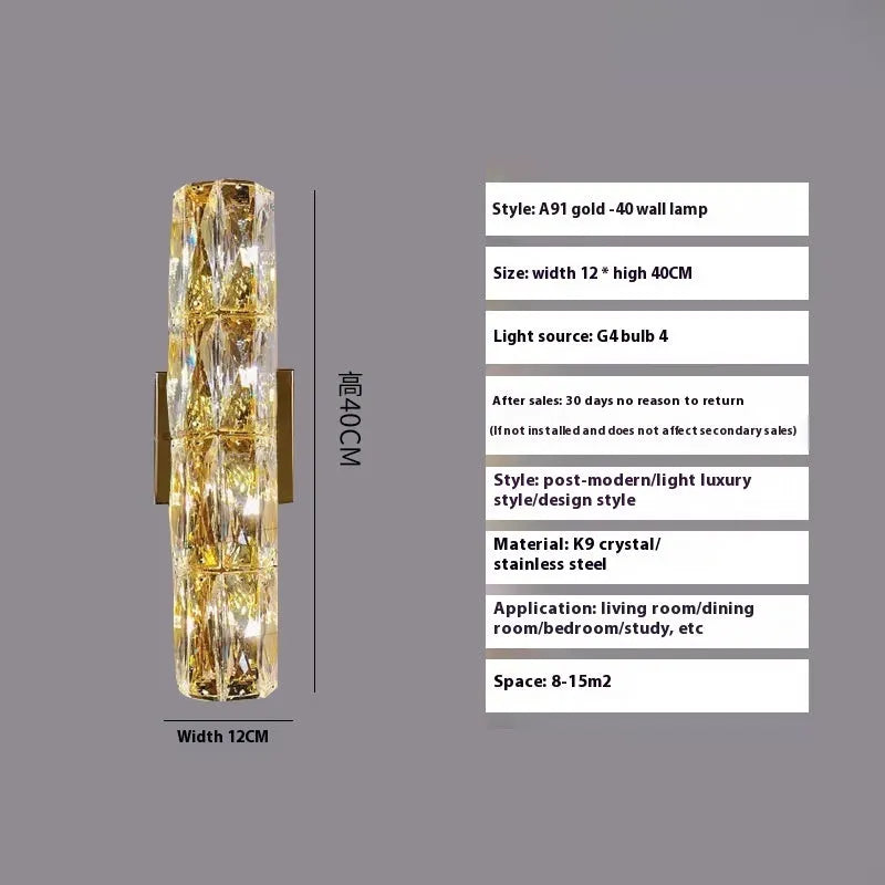 Slim crystal and stainless steel wall lamp with LED light on a wall.