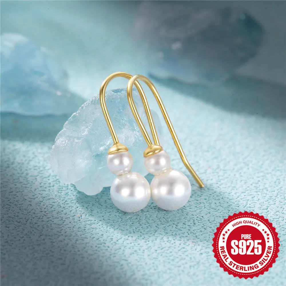 S925 sterling silver earrings with geometric sunflower pattern and golden zircon stones