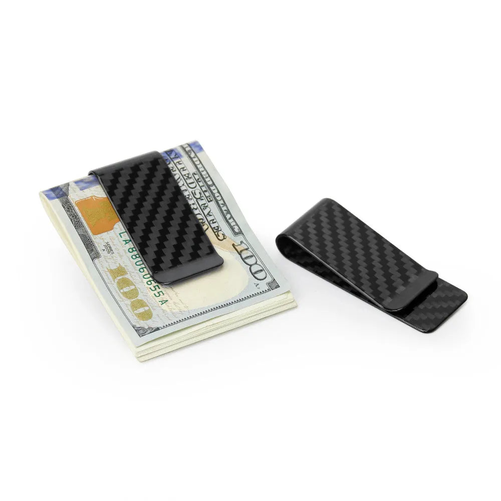 Glossy black carbon fibre money clip with striped pattern on white background