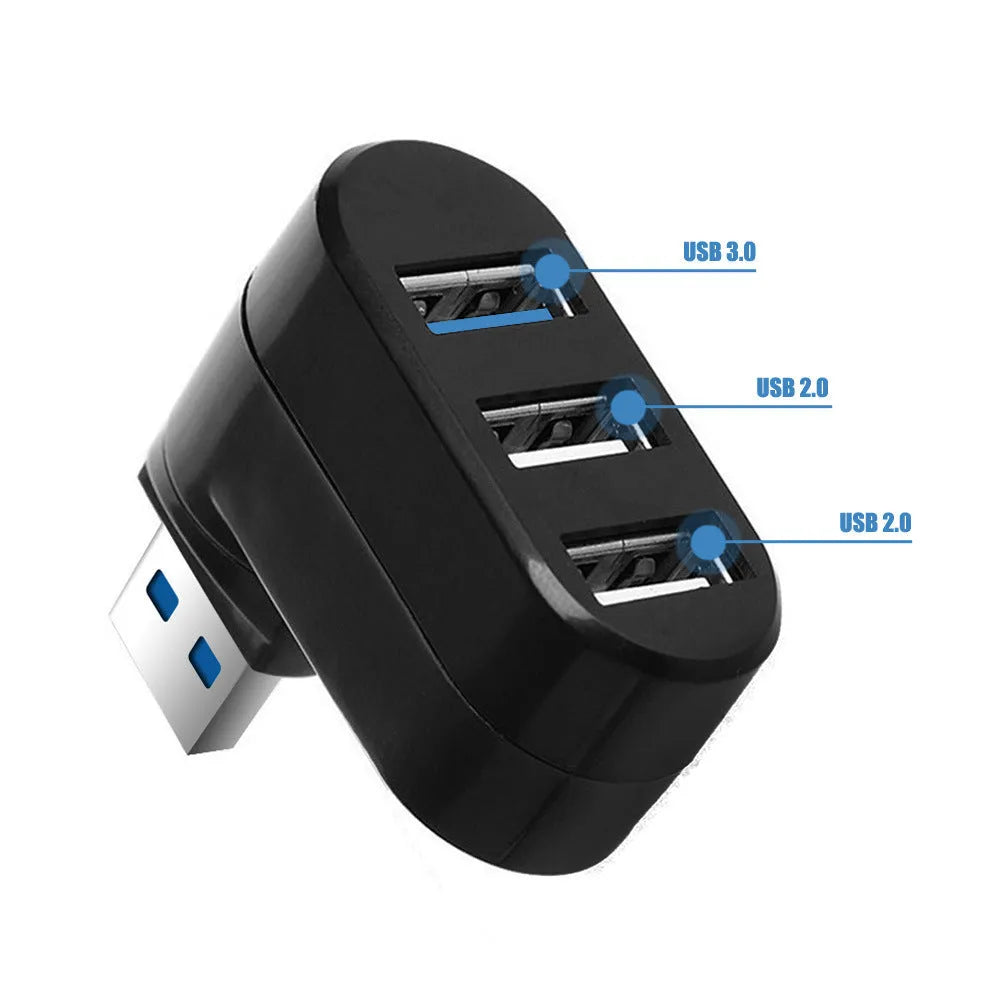 Black or white USB rotary splitter hub with four USB 3.0 ports on a desk.