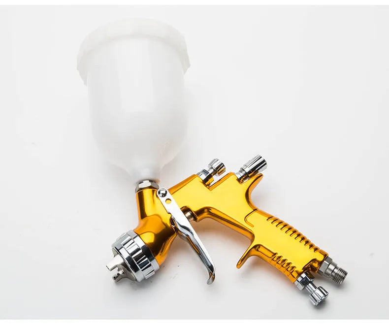 Gold aluminium alloy HVLP paint spray gun with 600cc plastic gravity cup and 1.3mm nozzle