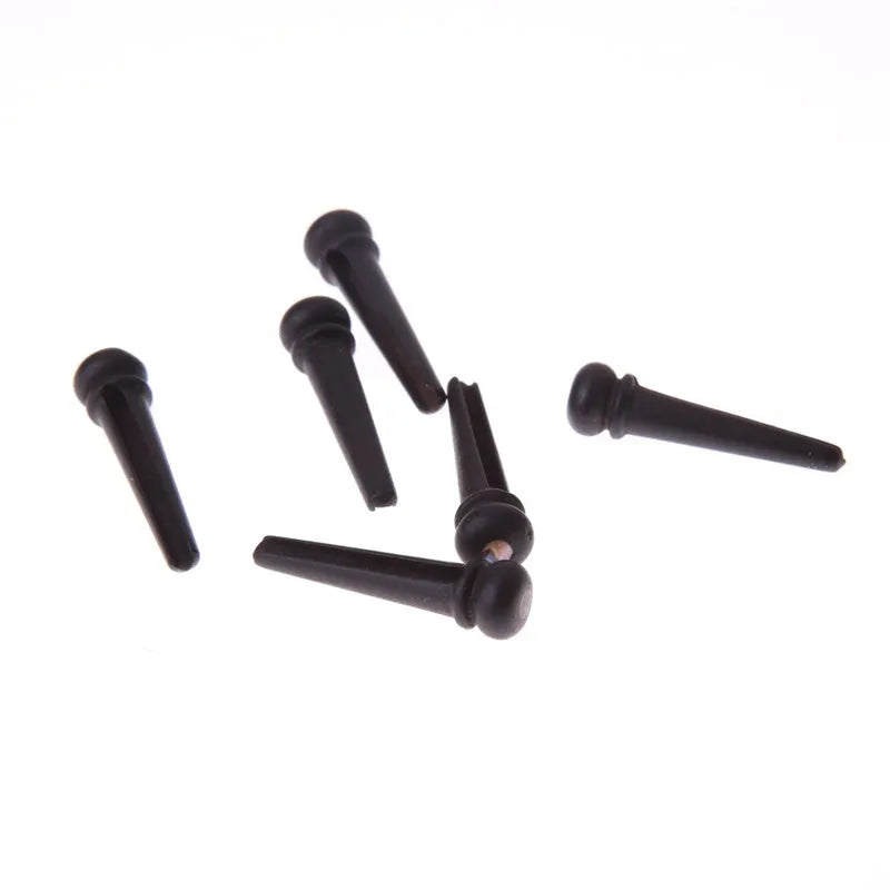 Six matt black ebony guitar string nails with 5.3mm bayonet diameter for folk acoustic guitars
