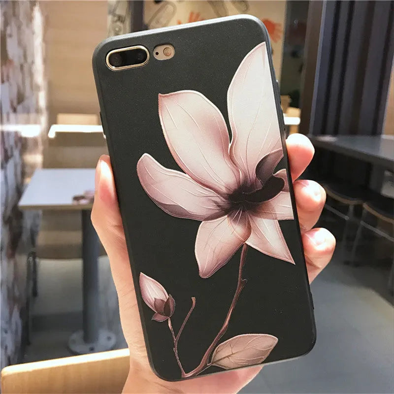 Black embossed flower design on a slim TPU iPhone case for iPhone 11.