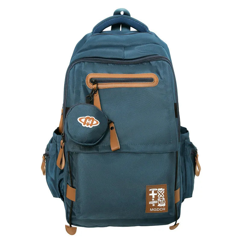 Large black nylon backpack for school with curved shoulder straps and sewing line detail