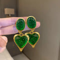 Silver needle pleated oval love heart stud earrings in alloy, showing green, purple, red, and yellow and white colour options.