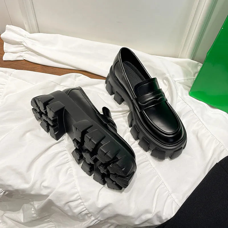 British style wide fit loafers with patent leather upper and muffin base heel in available sizes 32-43