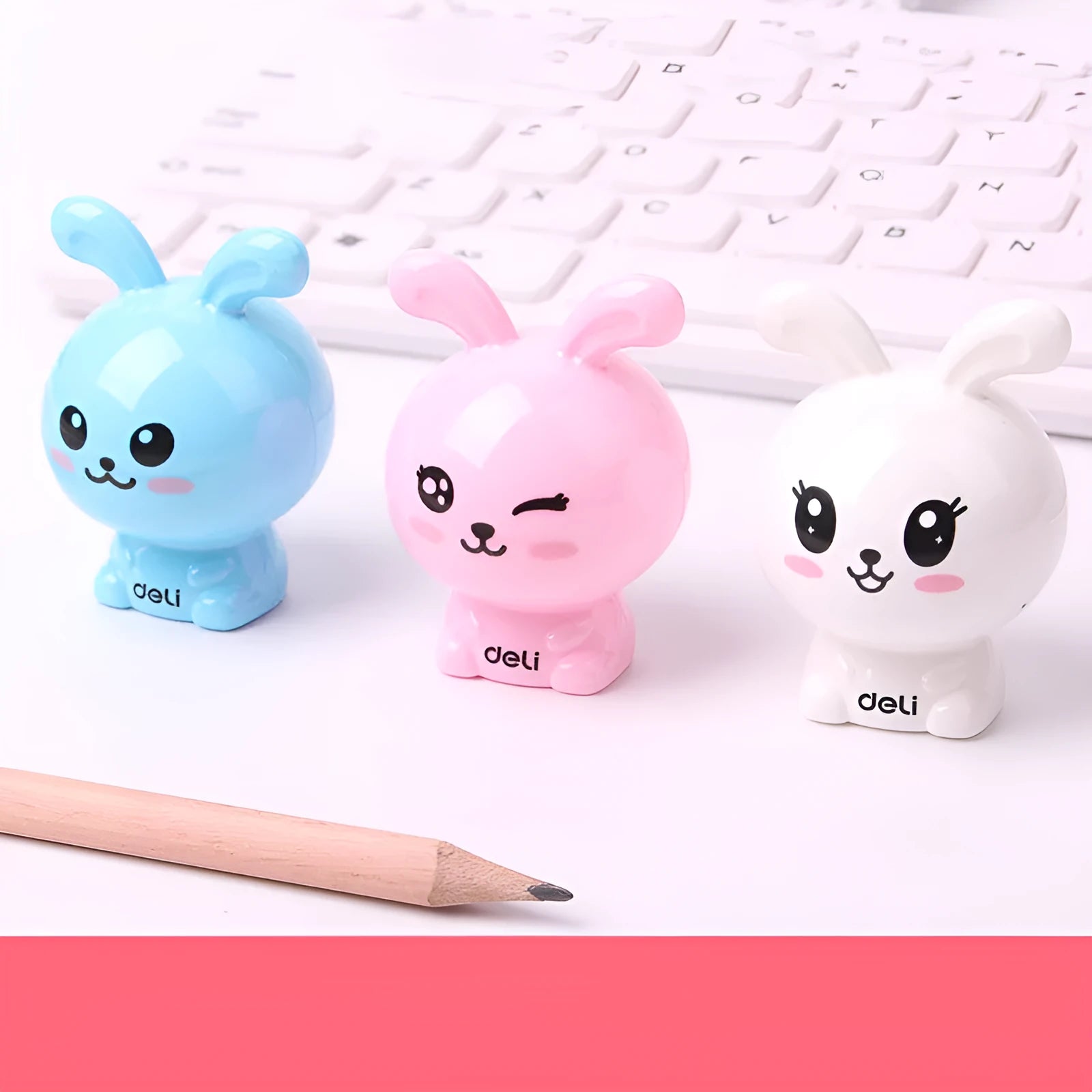 Mini cartoon pencil sharpener with random bunny design for children, plastic and metal construction