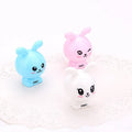 Mini cartoon pencil sharpener with random bunny design for children, plastic and metal construction