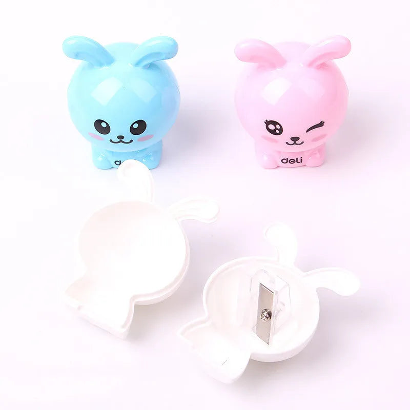 Mini cartoon pencil sharpener with random bunny design for children, plastic and metal construction