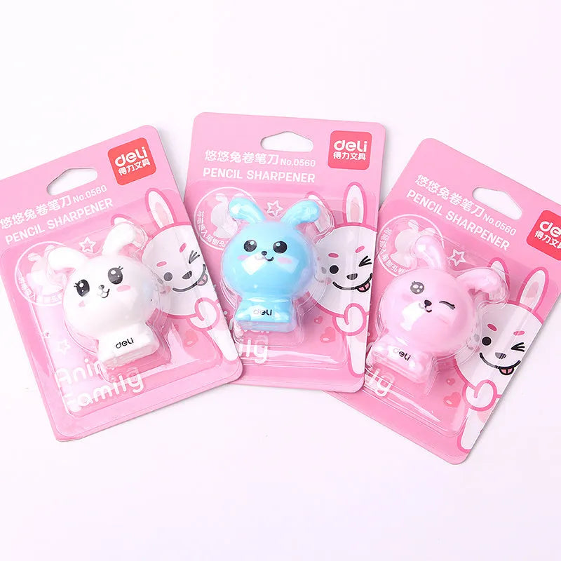 Mini cartoon pencil sharpener with random bunny design for children, plastic and metal construction