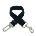 Dog traction belt with telescopic rope in black, on a green background