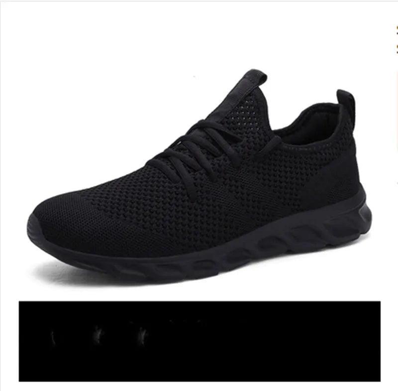 Men's black and white breathable mesh sneakers with lace-up closure and PVC sole