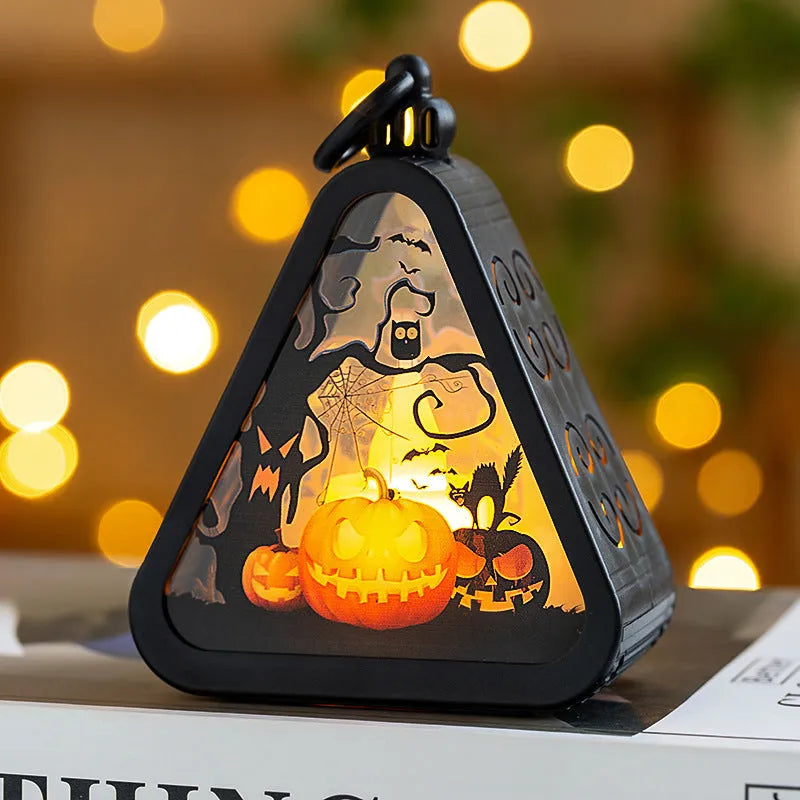Portable Halloween pumpkin lamp decoration in plastic and glass with four colour theme options