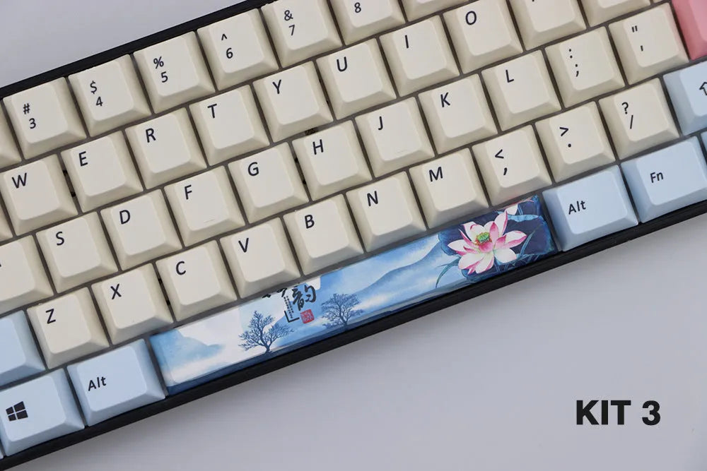 Single PBT plastic 6.25U space bar keycap for mechanical keyboards, shown in a selection of colours with dye-sublimated outline design.