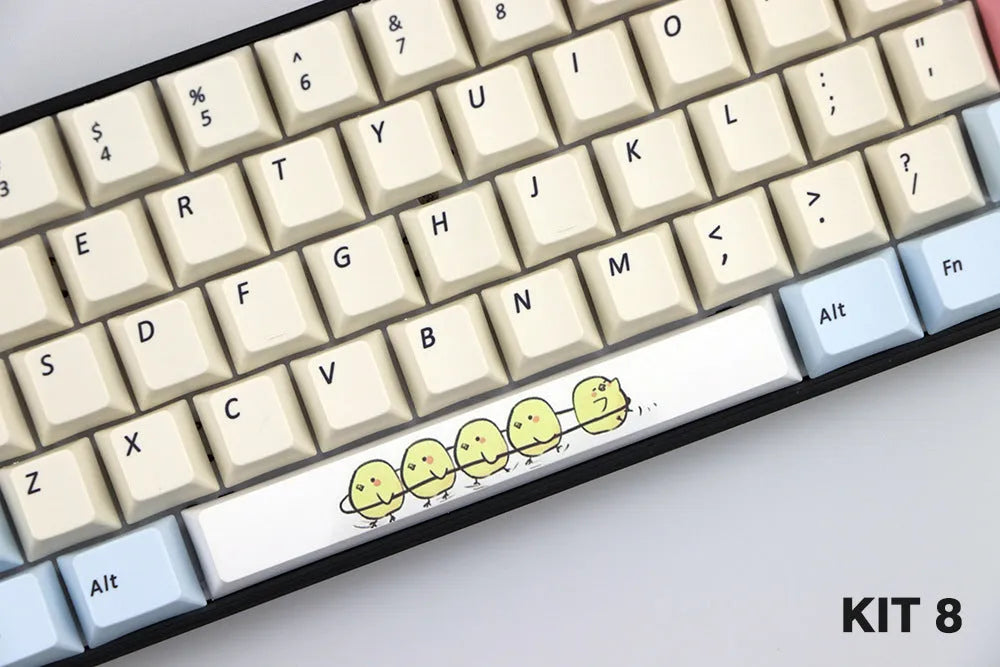 Single PBT plastic 6.25U space bar keycap for mechanical keyboards, shown in a selection of colours with dye-sublimated outline design.