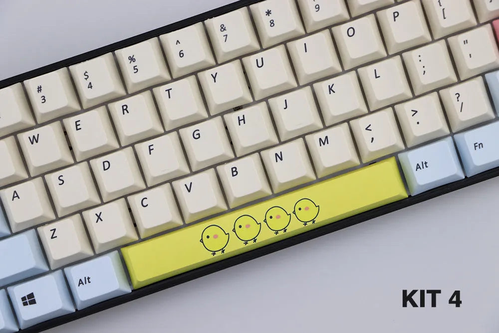 Single PBT plastic 6.25U space bar keycap for mechanical keyboards, shown in a selection of colours with dye-sublimated outline design.