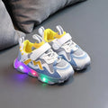 Children's mesh sneakers with Velcro fastening in black, grey, and pink colour options