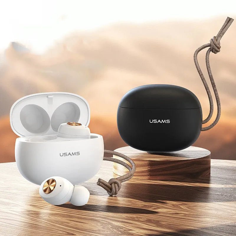 White Wireless Bluetooth Mini TWS earbuds shown next to their compact, rectangular charging case.