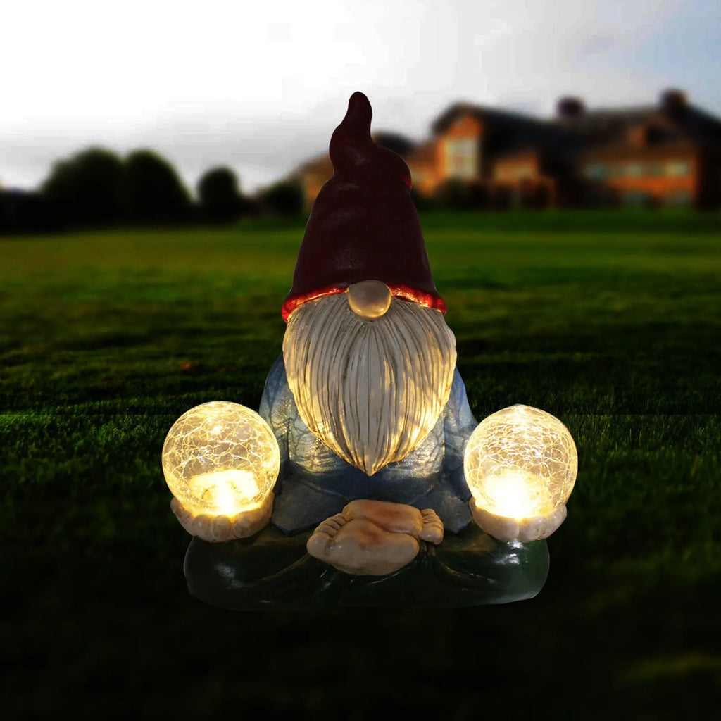 Solar LED resin dwarf doll garden statue with faceless old man design, measuring 27x20cm.