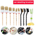 Round head car washing brush with pig bristles and wooden handle on a workbench