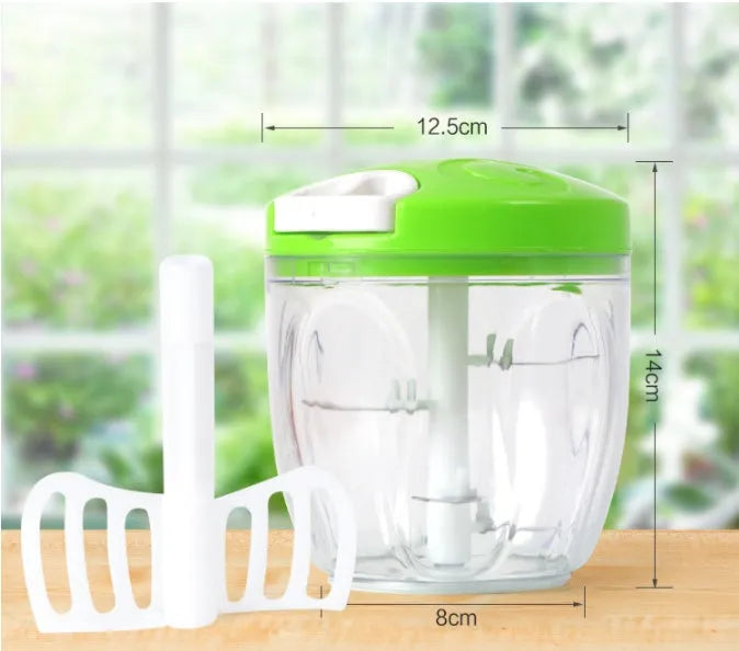 Green manual kitchen chopper with lid, three stainless steel blades visible inside 500ml bowl.