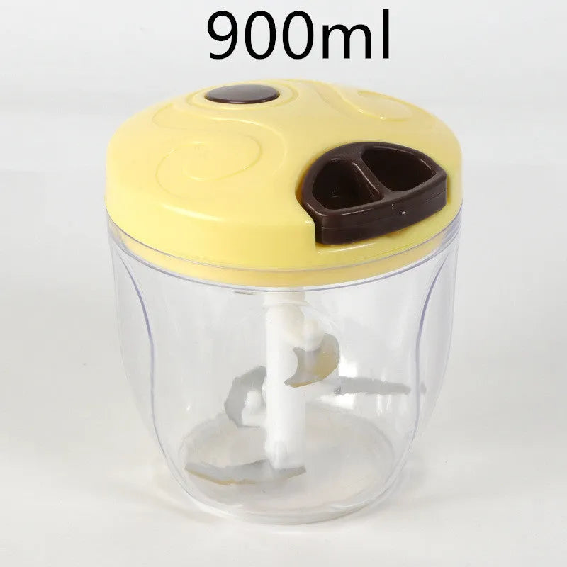 Green manual kitchen chopper with lid, three stainless steel blades visible inside 500ml bowl.