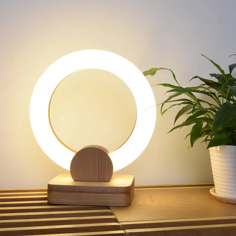 Nordic style wooden circular chandelier with round acrylic shade, shown in 20cm and 30cm diameter options.