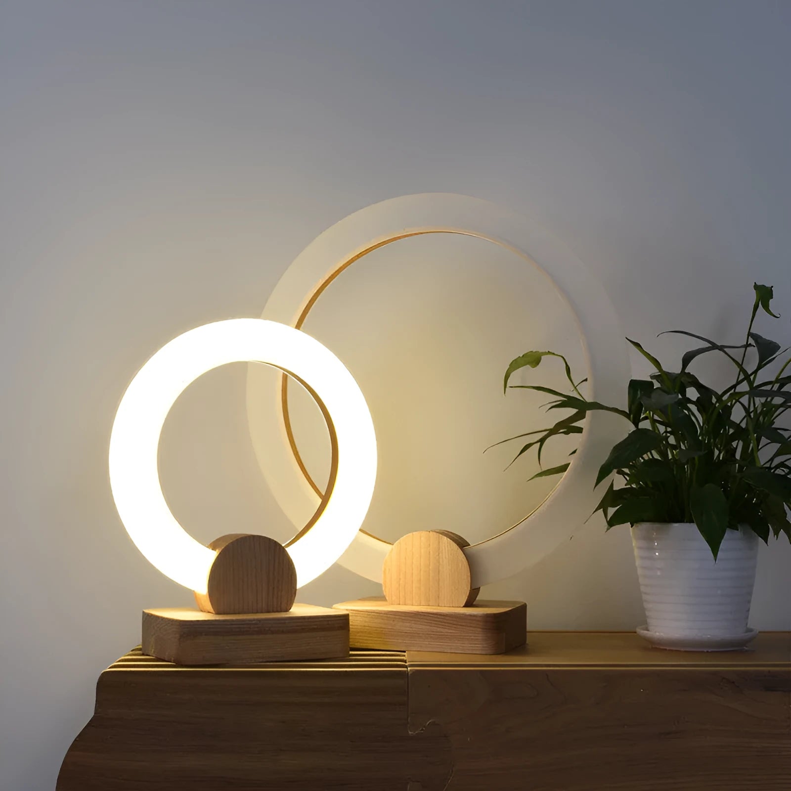 Nordic style wooden circular chandelier with round acrylic shade, shown in 20cm and 30cm diameter options.
