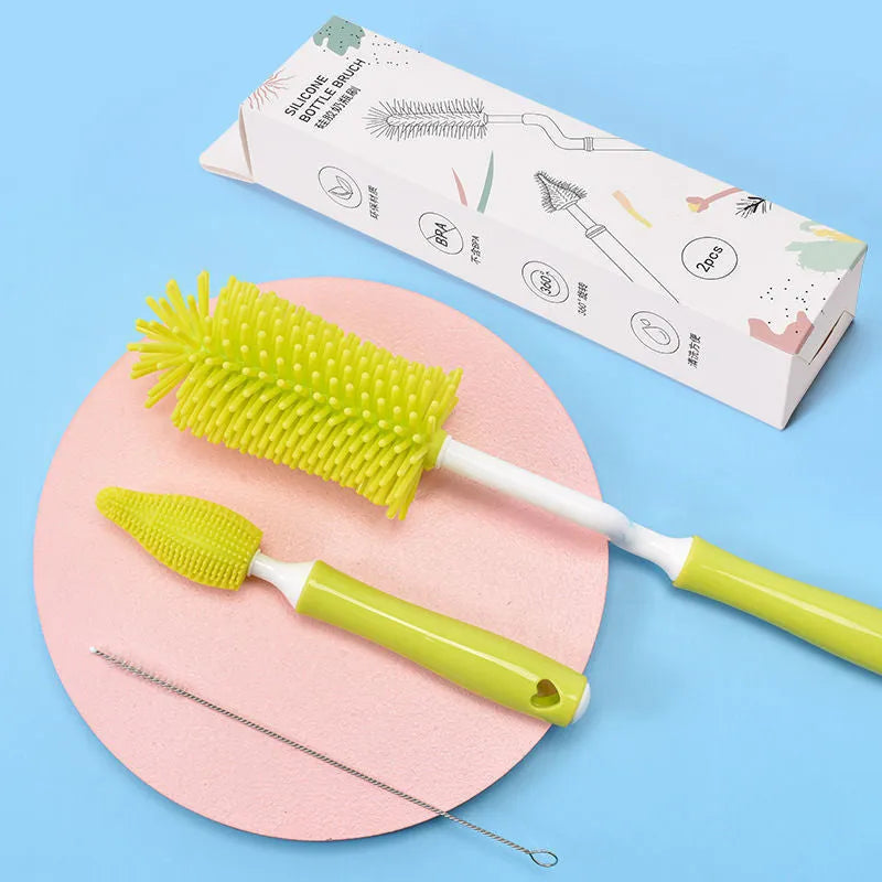 Silicone baby bottle brush and straw cleaning tool set in assorted colours.