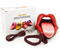 Red lip novelty telephone with LED indicator on a desk
