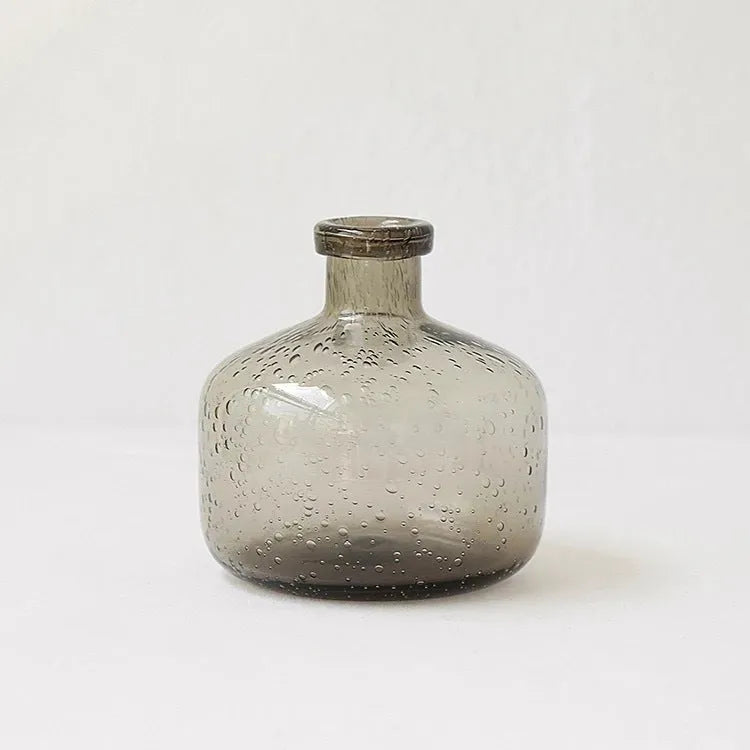 Grey geometric bubble glass vase with stained glass construction and distinctive surface texture