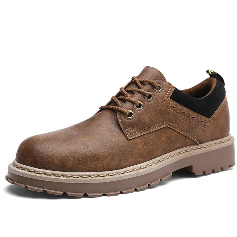 Men's black casual shoes with round toe and front-tie lacing on a rubber sole