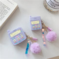 Purple silicone Apple AirPods case with clamshell design and attached fur ball pendant