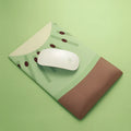 Colourful thickened cloth and silicone wrist support mouse pad on a desk