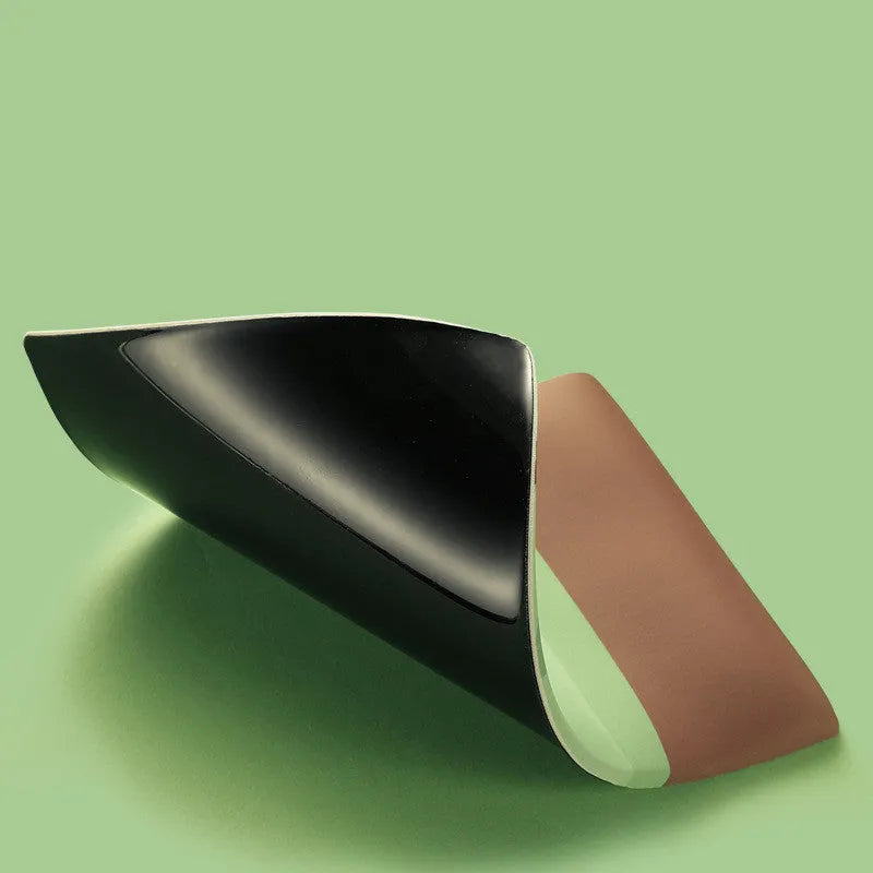 Colourful thickened cloth and silicone wrist support mouse pad on a desk