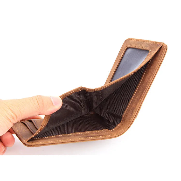 Slim brown leather men's RFID wallet showing cash pocket and card slot.