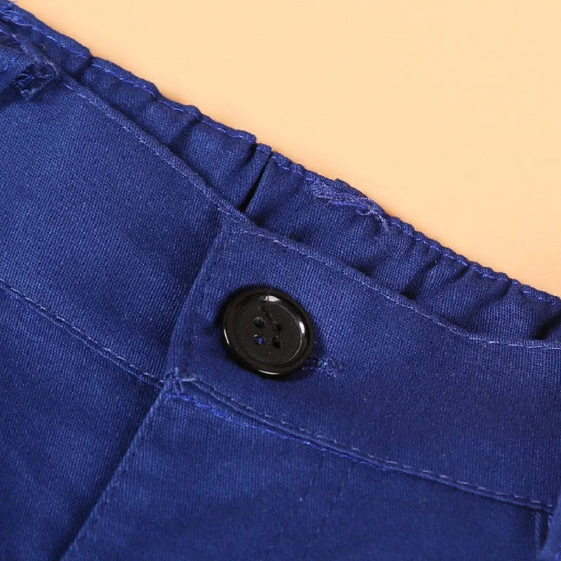 Boys' casual suit clothing set comprising a blue turtleneck, matching vest, tie, and trousers.