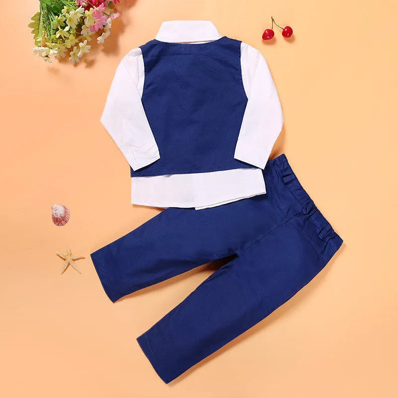 Boys' casual suit clothing set comprising a blue turtleneck, matching vest, tie, and trousers.