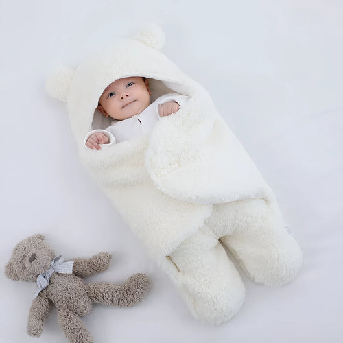 Baby quilted sleeping bag wrapper in cotton blend fabric showing six colour options and three size measurements