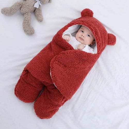 Baby quilted sleeping bag wrapper in cotton blend fabric showing six colour options and three size measurements