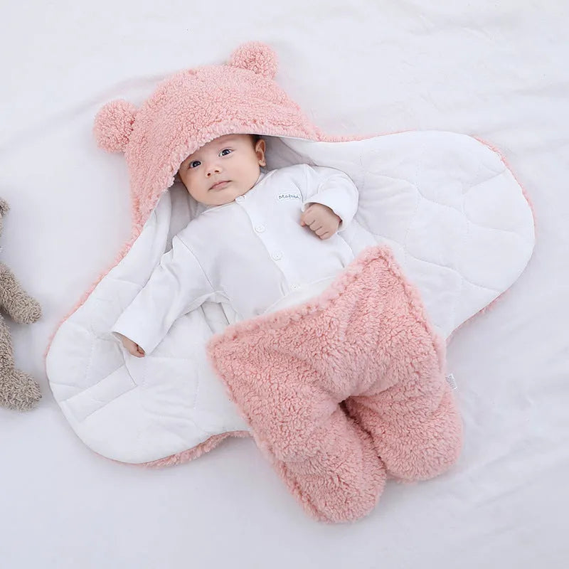 Baby quilted sleeping bag wrapper in cotton blend fabric showing six colour options and three size measurements