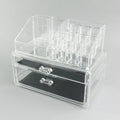 Transparent acrylic makeup storage case showing foldable design and clear material
