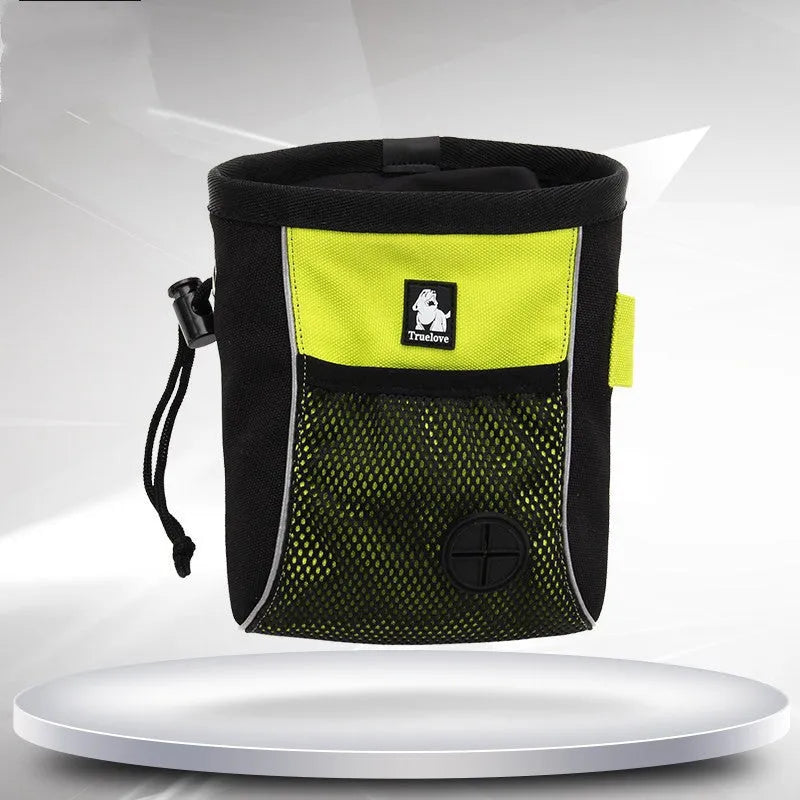 Green waterproof dog training waist bag with removable waste compartment shown on person during walk